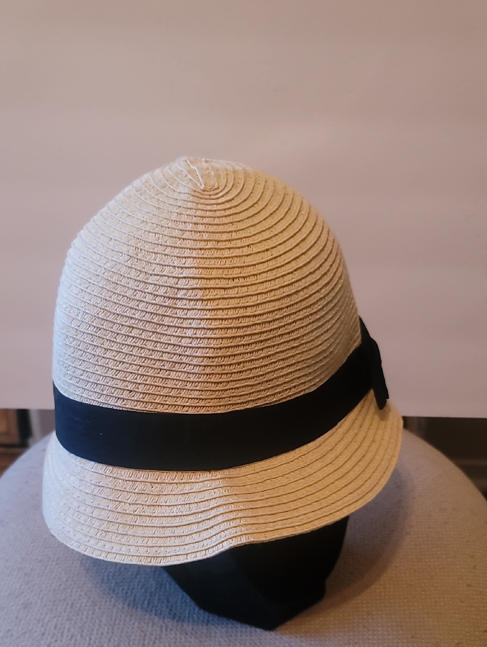 Women's Cream Straw Cloche Hat with Black Side Bow.